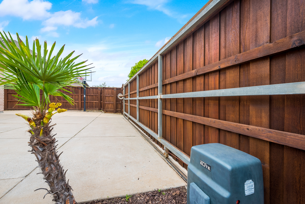    Electric Gate and Basketball Hoop 