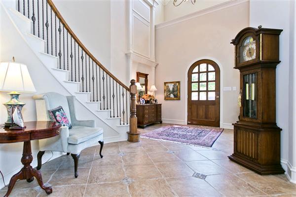    Soaing Ceiling and Wrought Iron Spindles 