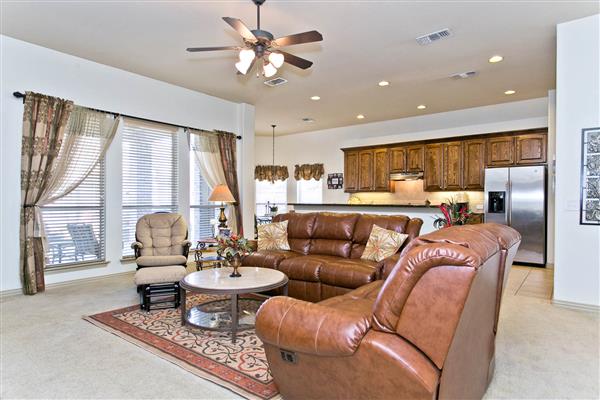    Large Windows overlooking Patio and Pool 