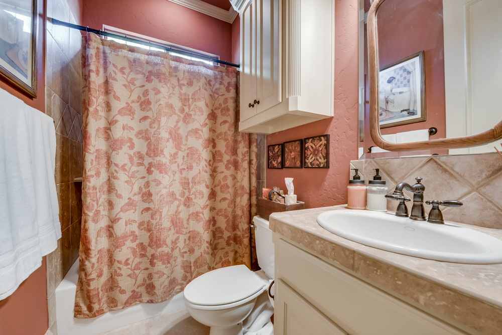    Full Bathroom separates the Secondary Bedrooms 