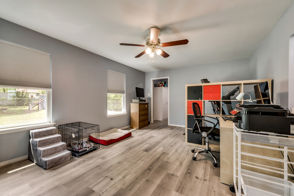    Game Room Addition with Paneless Windows with Backyard Views 