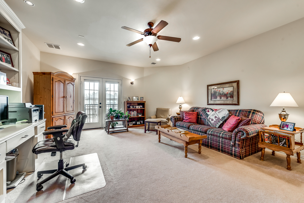    Upstairs Game Room with Built Ins and Balcony 