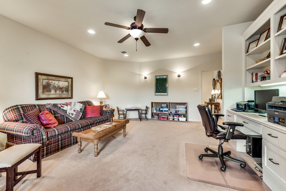    Upstairs Game Room with Built Ins and Balcony 