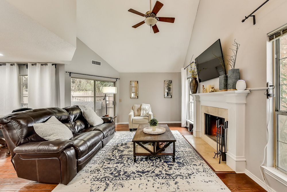    Inviting Family Room with Wood Burning Fireplace 