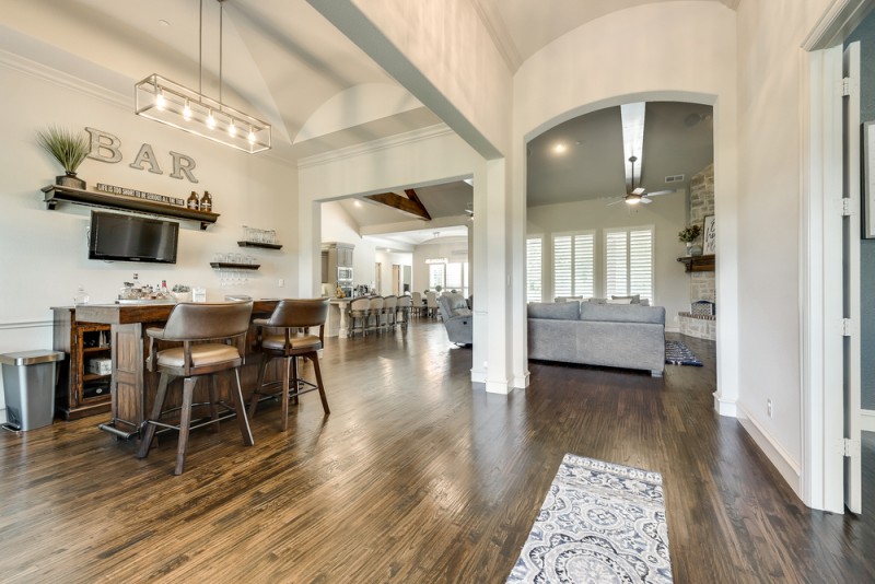    Hand scraped Hardwoods stretch through Main Living Areas 