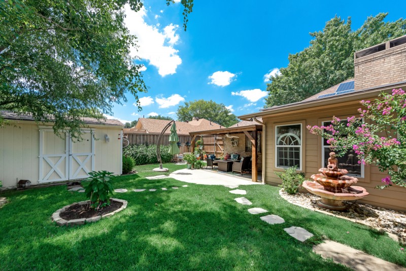    Backyard Oasis with Storage Shed 