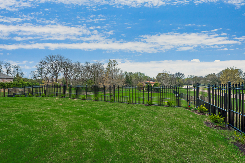    Large Grassy Backyard Ready for Pool or Playground and Hours of Fun 