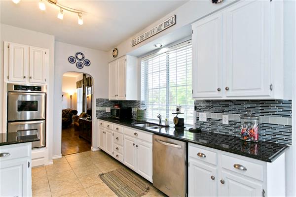    Granite with Cut Glass Back Splash 