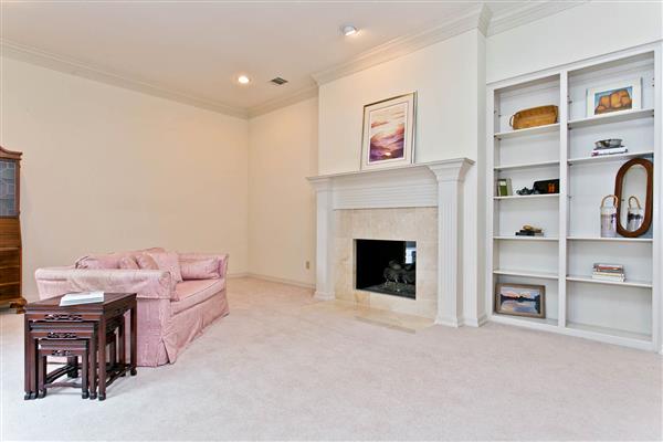    Custom Built ins and Double Fireplace 