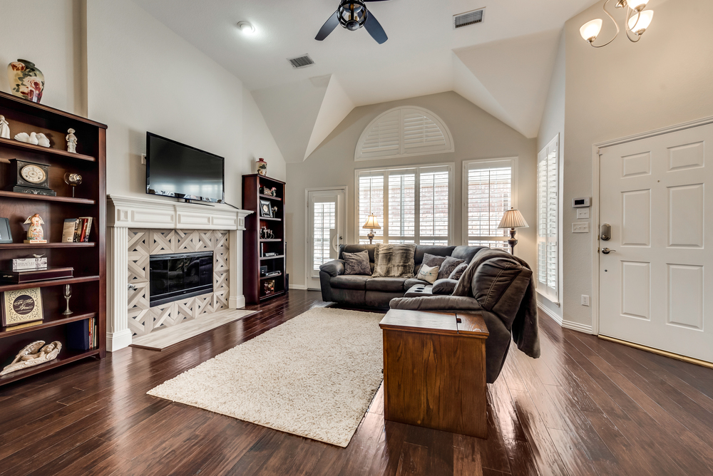    Inviting Family Room with Tile Fireplace and Wall of Windows 