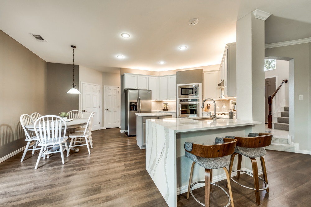    Gourmet Kitchen has Cambria Quartz with Waterfall Edge 