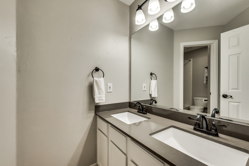    Full Hollywood Bathroom with Dual Sinks and Cambria Quartz Countertops 