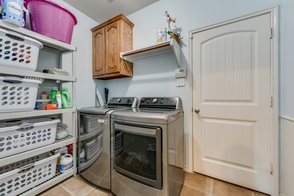    Utility Room with Built in Cabinetry 