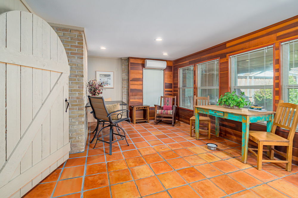    Climate Controlled Sunroom with Patio Views 