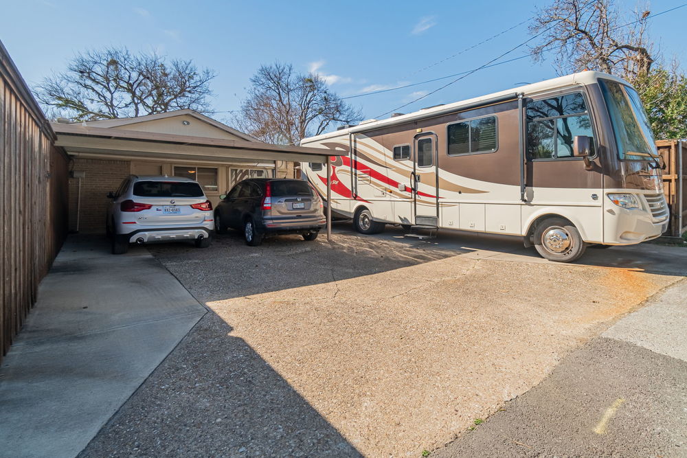    Two Car Carport and Additional Parking Slab with   AMP Exterior Outlet for RV or Electric Car 