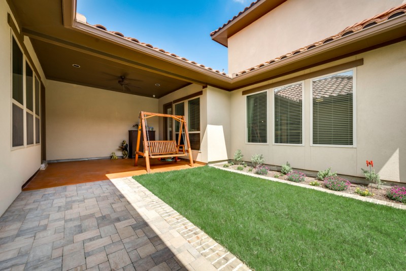    Backyard Courtyard with Covered Patio leading to Detached   Car Garage 