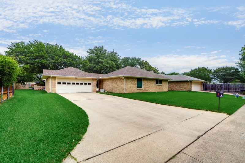    Grassy Backyard with Extended Rear Drive 