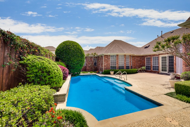    Serene Backyard with Sparkling Swimming Pool 