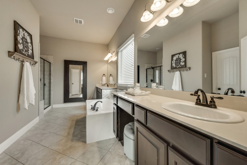    Spa Like Master Bathroom with Separate Vanities 