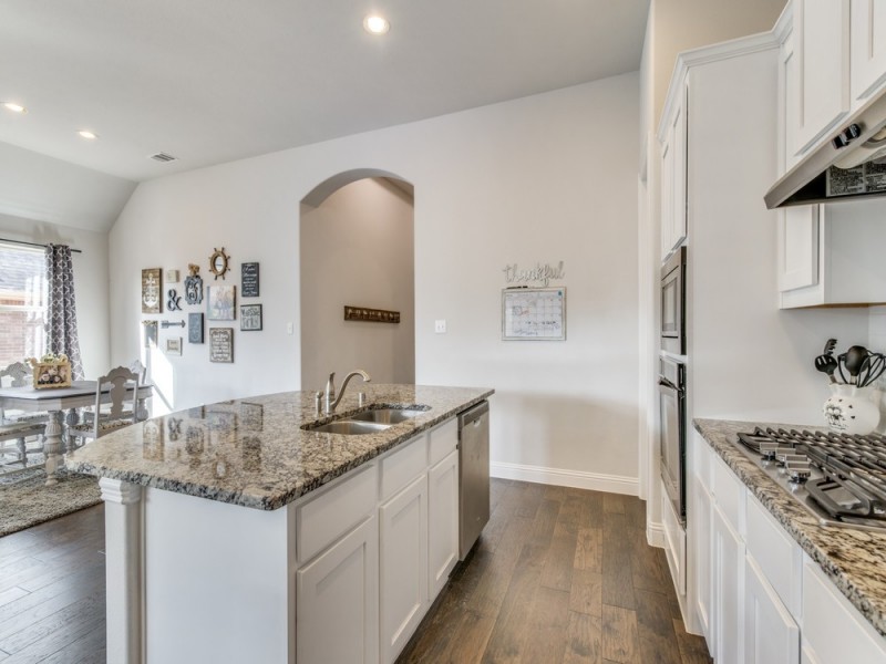    Stainless Steel Appliances in Kitchen 