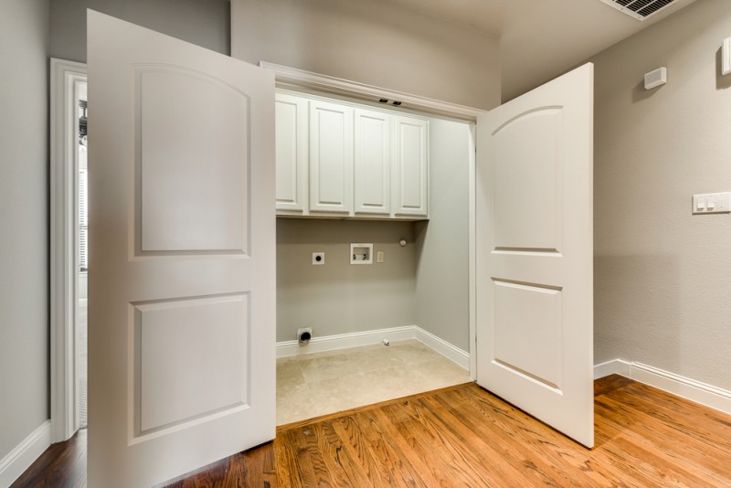    Utility Closet with Built In Cabinetry 