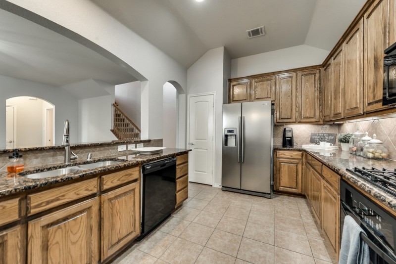    Gourmet Kitchen with Granite Countertops 