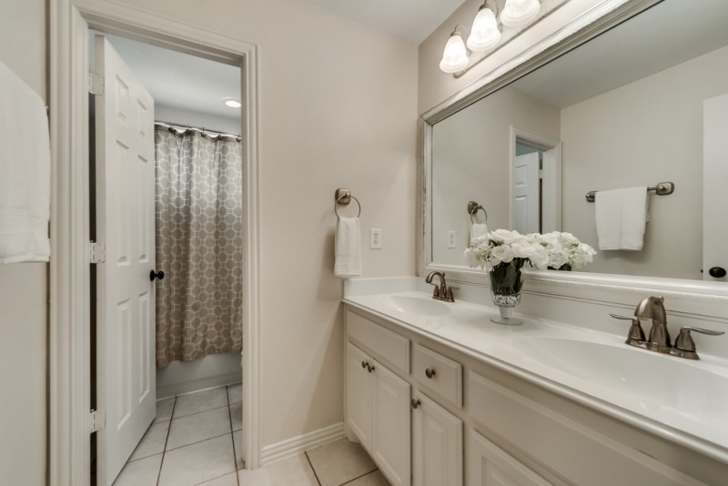    Full Bathroom with Dual Sinks 