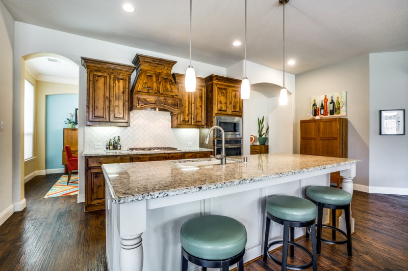    Subway Tile Backsplash and Pendant Lighting 