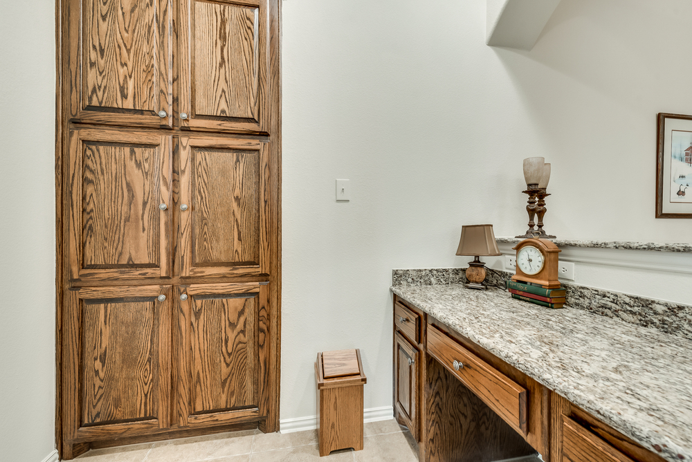    Built In Granite Topped Desk and  Cabinetry 