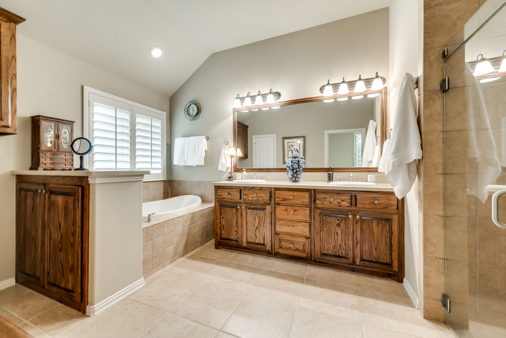    Master Bathroom with Soaker Tub and Seamless Glass Shower 