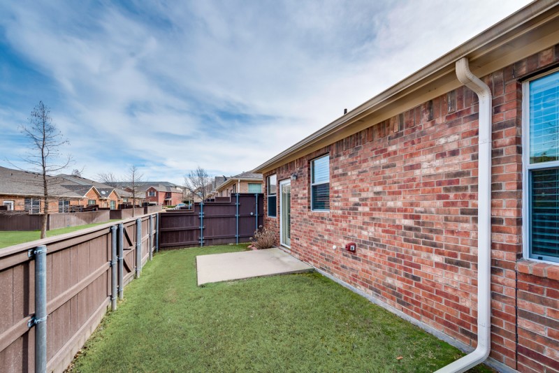    Backyard Patio and Grassy Area 