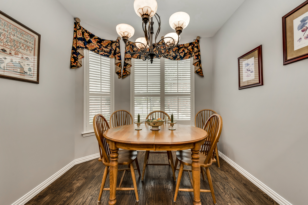    Charming Breakfast Area with Plantation Shutters 