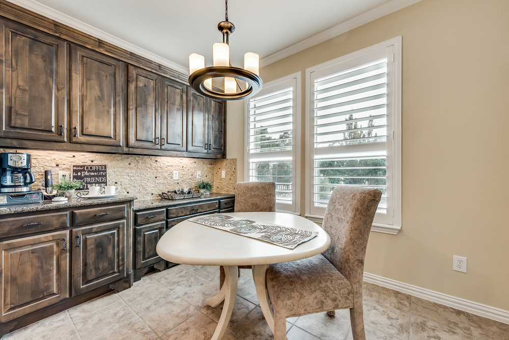    Charming Breakfast Area with Built In Hutch and Backyard Views 