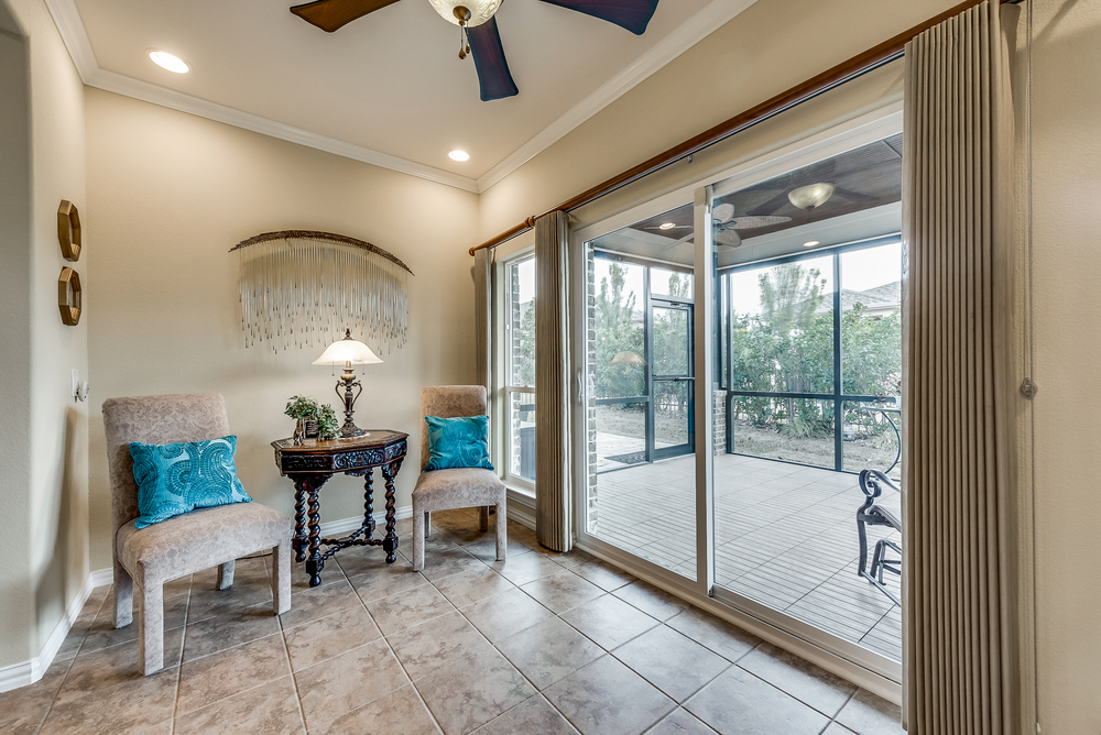    Sunroom with Slider out to Screened Porch 