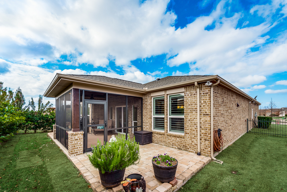    Extended Patio and Grassy Backyard 