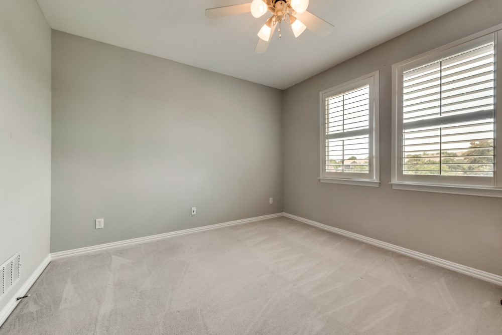    Secondary Bedroom with plantation Shutters 