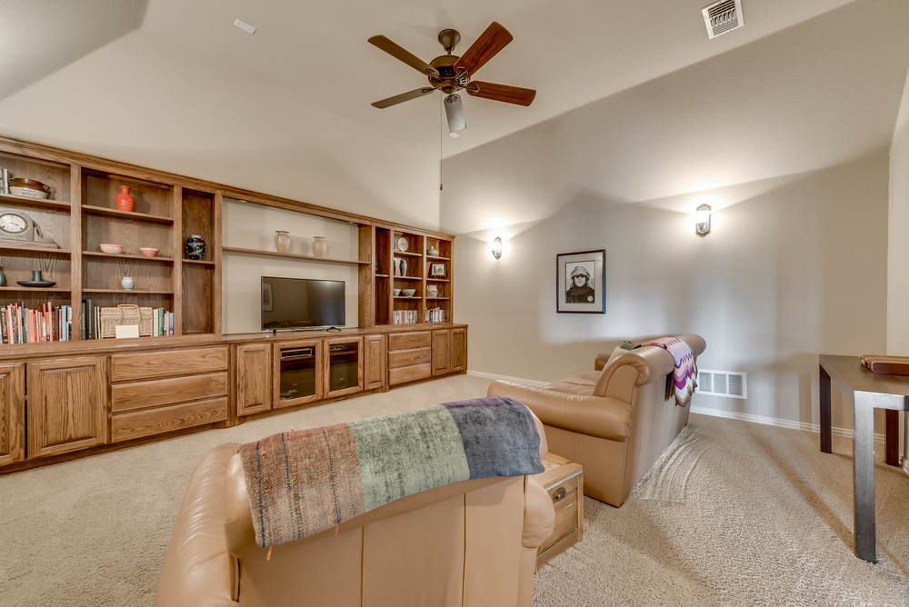    Media Room with Wall of Built Ins 