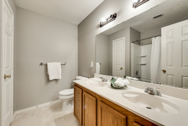    Full Bathroom with Dual Sinks 