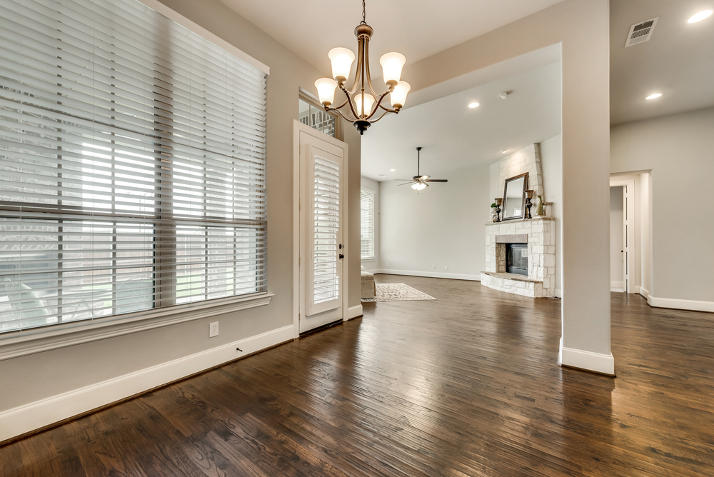    Breakfast Area with Ample Natural Light Looking out to Covered Patio 