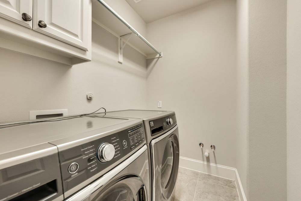    Utility Room is Plumbed for Sink with Built In Mud Bench Adjacent 